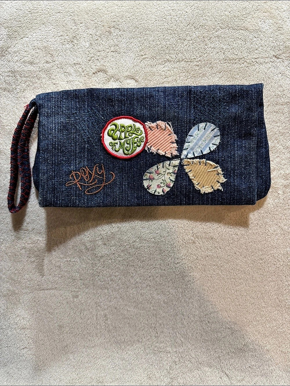 Roxy Denim Embroidered Wristlet Clutch in Blue & Red